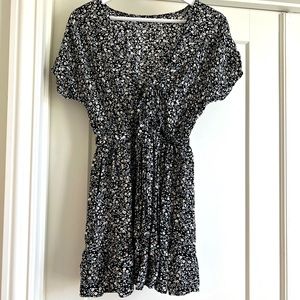 Black and floral sundress. Open back with tie. Size M